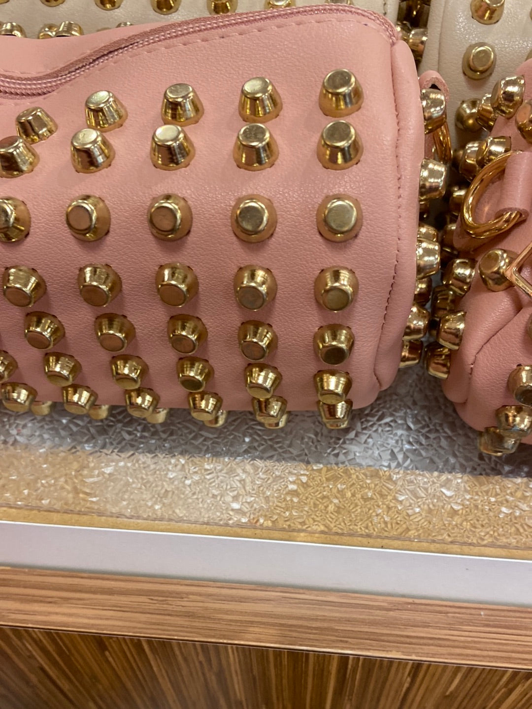 Pink spike purse