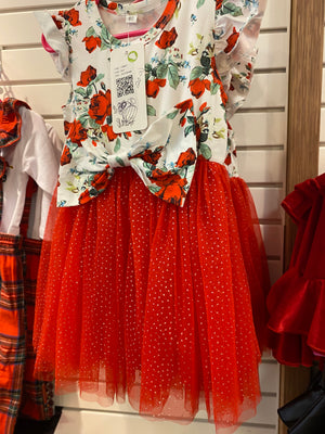 Floral red and white dress with a big bow on the from